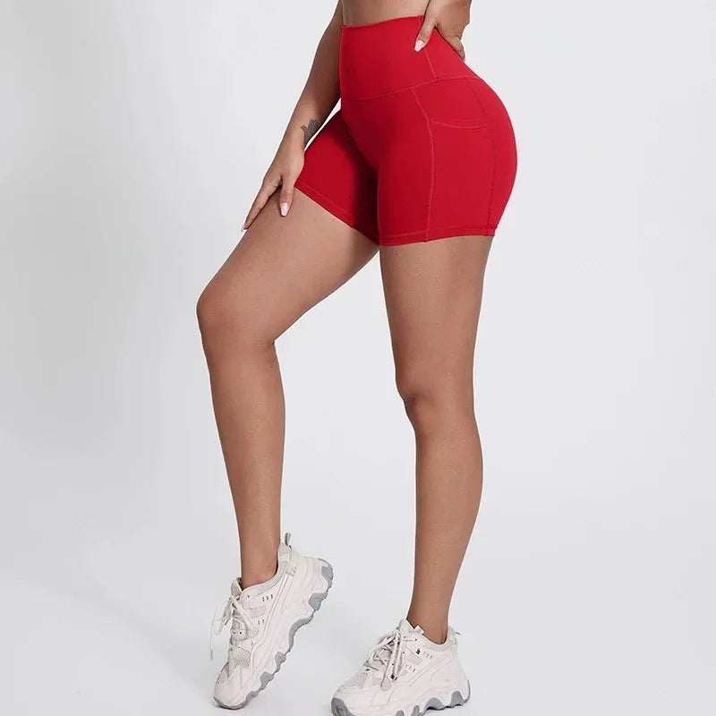 High-waisted nylon knit yoga shorts with welt pockets in multiple colors and sizes - product image