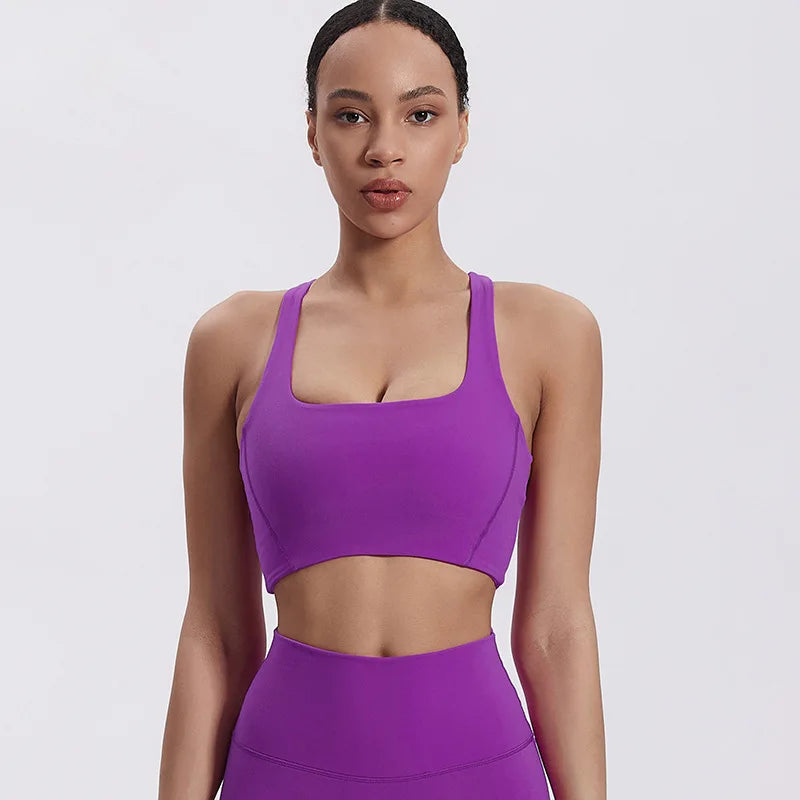 Nylon padded racerback mid impact sports bra crop top for yoga workout - product image