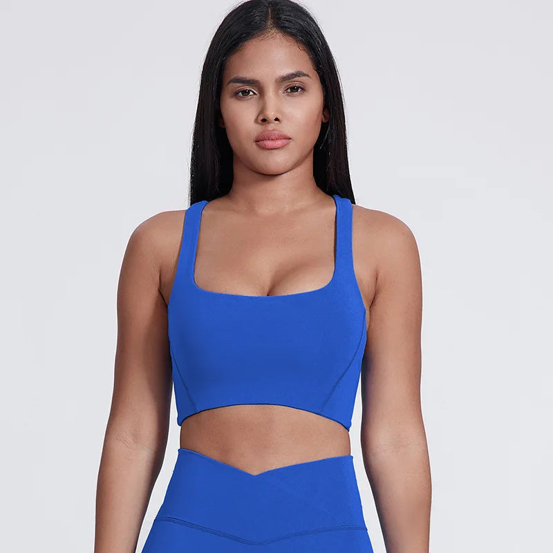 Nylon padded racerback mid impact sports bra crop top for yoga workout - product image