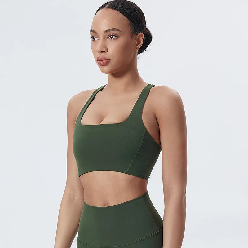 Nylon padded racerback mid impact sports bra crop top for yoga workout - product image