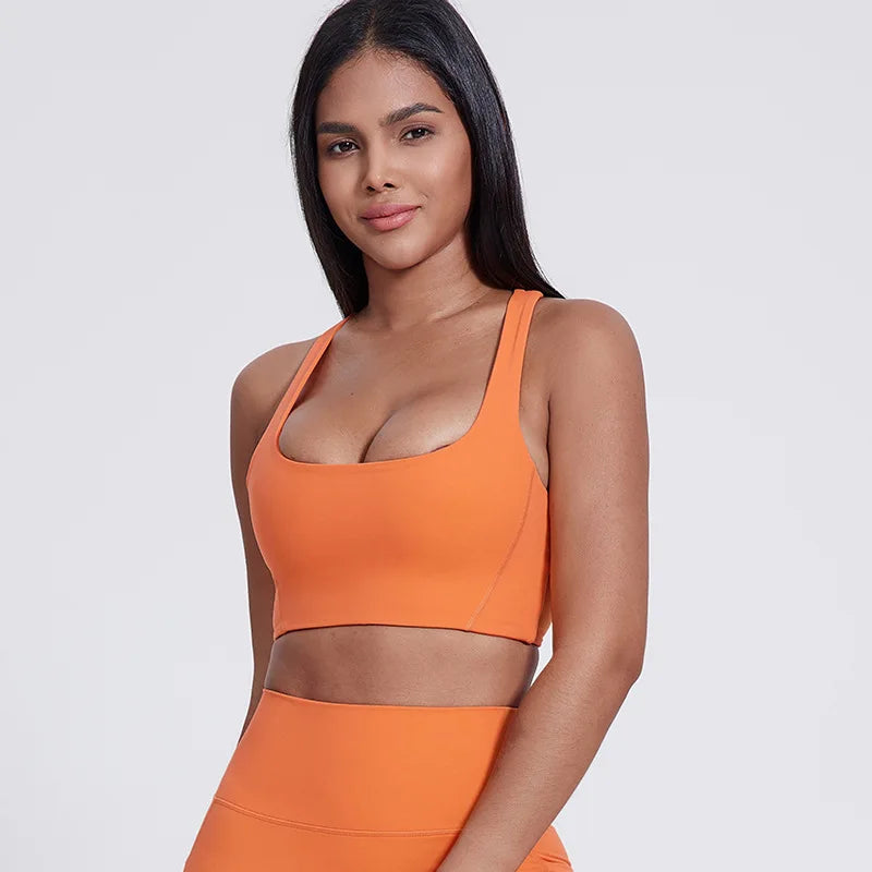 Nylon padded racerback mid impact sports bra crop top for yoga workout - product image