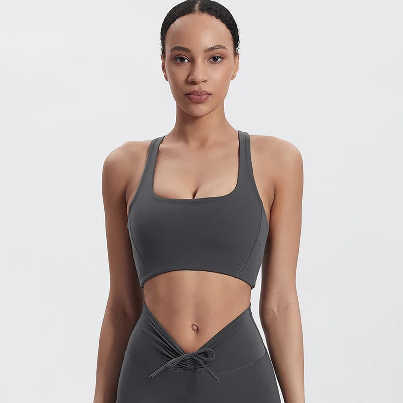 Nylon padded racerback mid impact sports bra crop top for yoga workout - product image