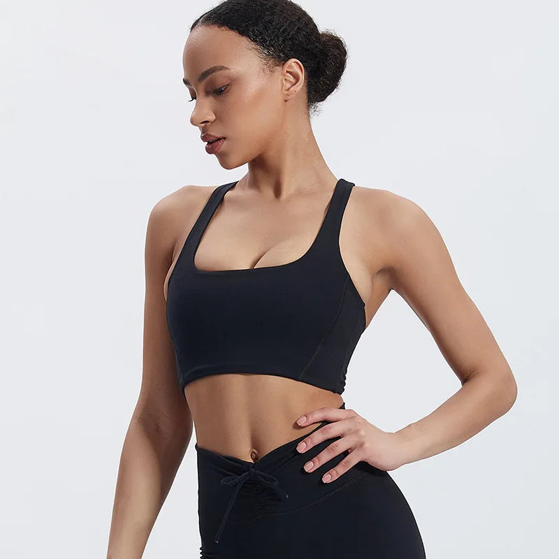 Nylon padded racerback mid impact sports bra crop top for yoga workout - product image