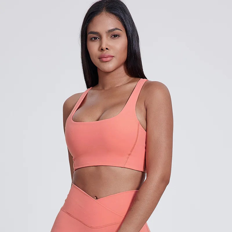 Nylon padded racerback mid impact sports bra crop top for yoga workout - product image