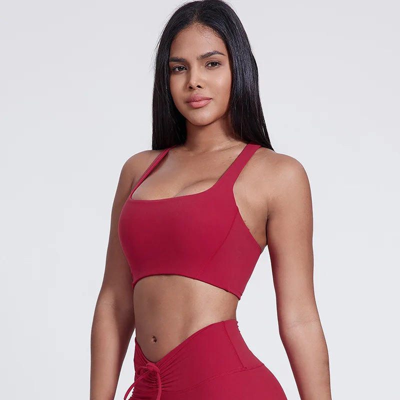 Nylon padded racerback mid impact sports bra crop top for yoga workout - product image