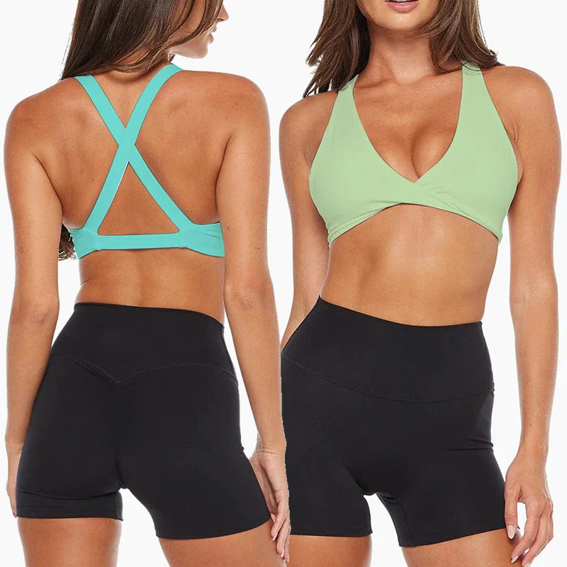 Strappy cross back padded nylon spandex knit yoga bra with twist front design - product image
