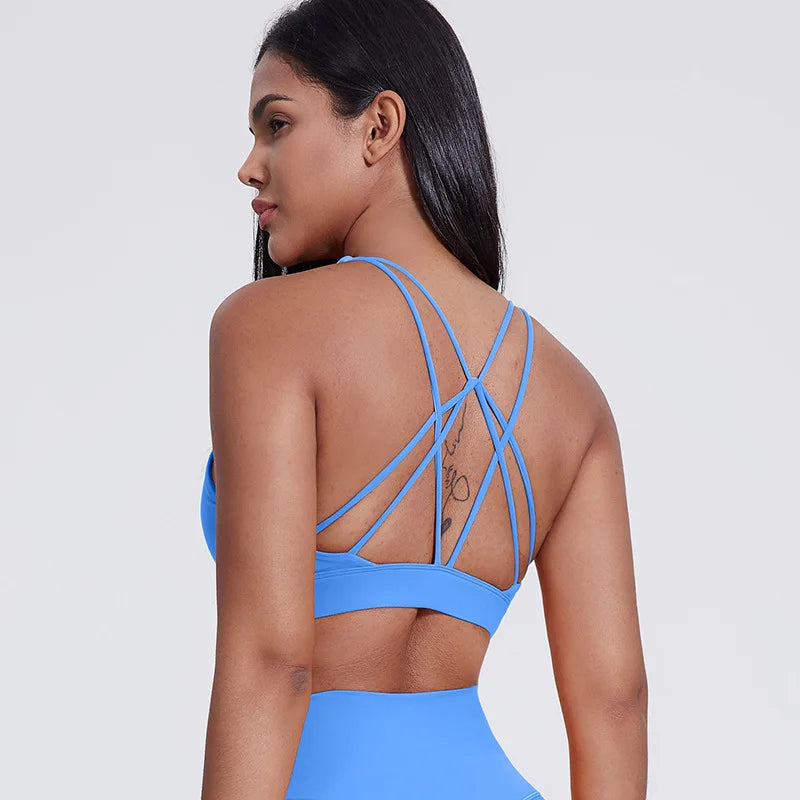 Strappy padded cross back polyester knit fitness sports bra - product image