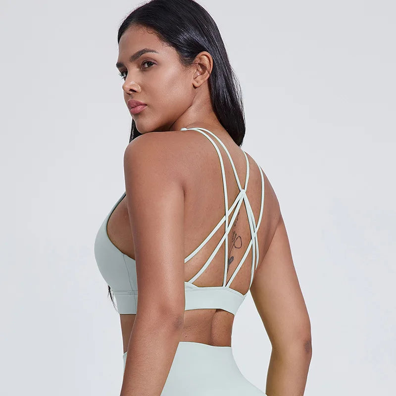Strappy padded cross back polyester knit fitness sports bra - product image