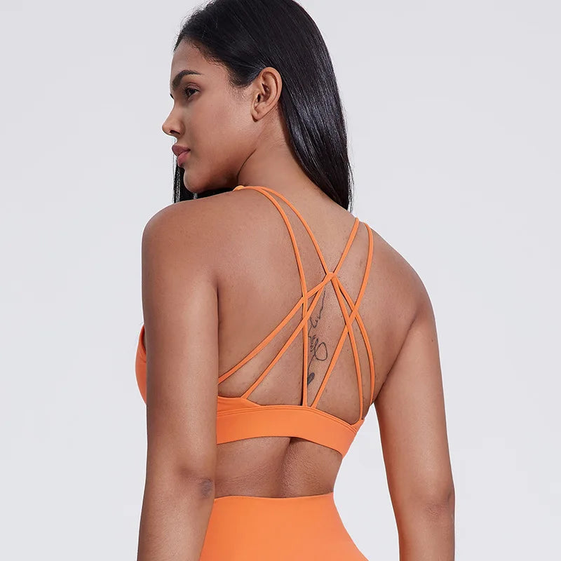 Strappy padded cross back polyester knit fitness sports bra - product image