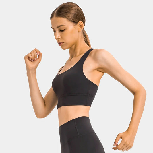 Cross strap mid support padded nylon spandex knit sports bra for fitness - product image