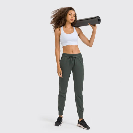 Naked feel knit nylon spandex joggers with waist drawstring and side pockets - product image