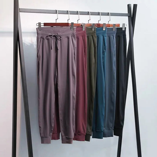 Naked feel knit nylon spandex joggers with waist drawstring and side pockets - product image