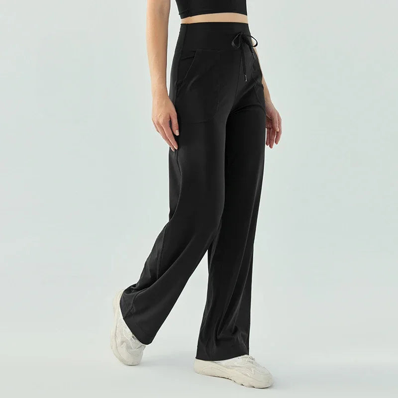Nude color elastic waist nylon knit fitness trousers with welt pockets - product image