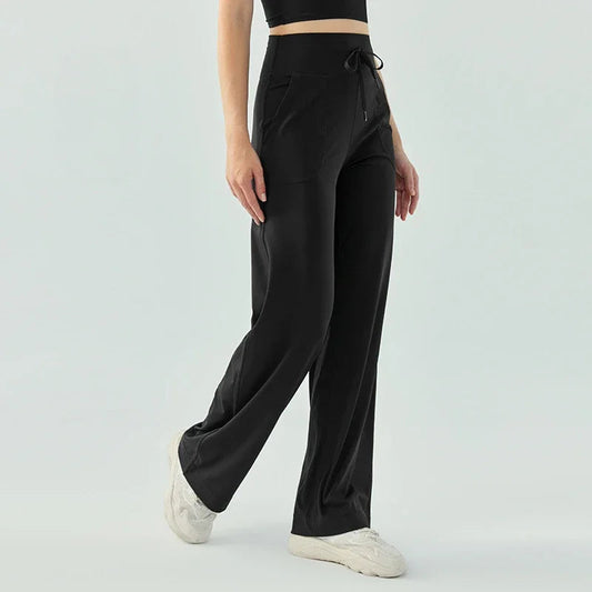 Nude color elastic waist nylon knit fitness trousers with welt pockets - product image