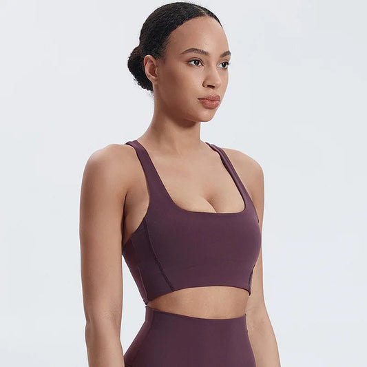Nylon padded racerback mid impact sports bra crop top for yoga workout - product image