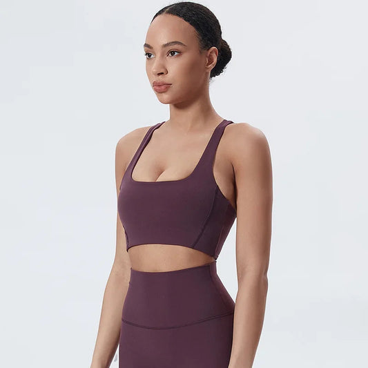 Nylon padded racerback mid impact sports bra crop top for yoga workout - product image