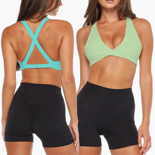 Strappy cross back padded nylon spandex knit yoga bra with twist front design - product image