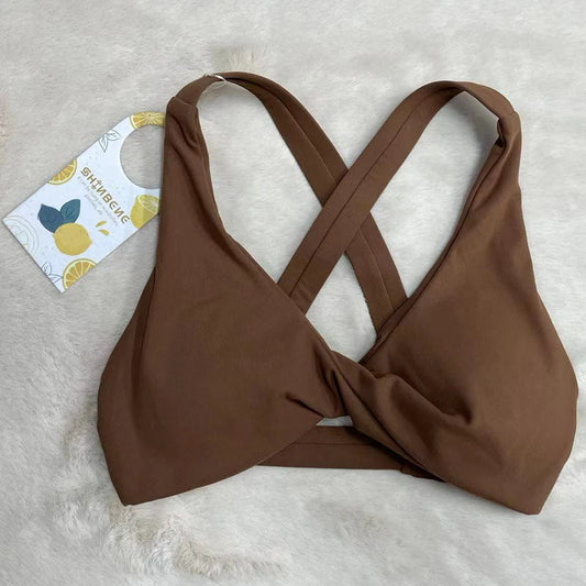 Strappy cross back padded nylon spandex knit yoga bra with twist front design - product image